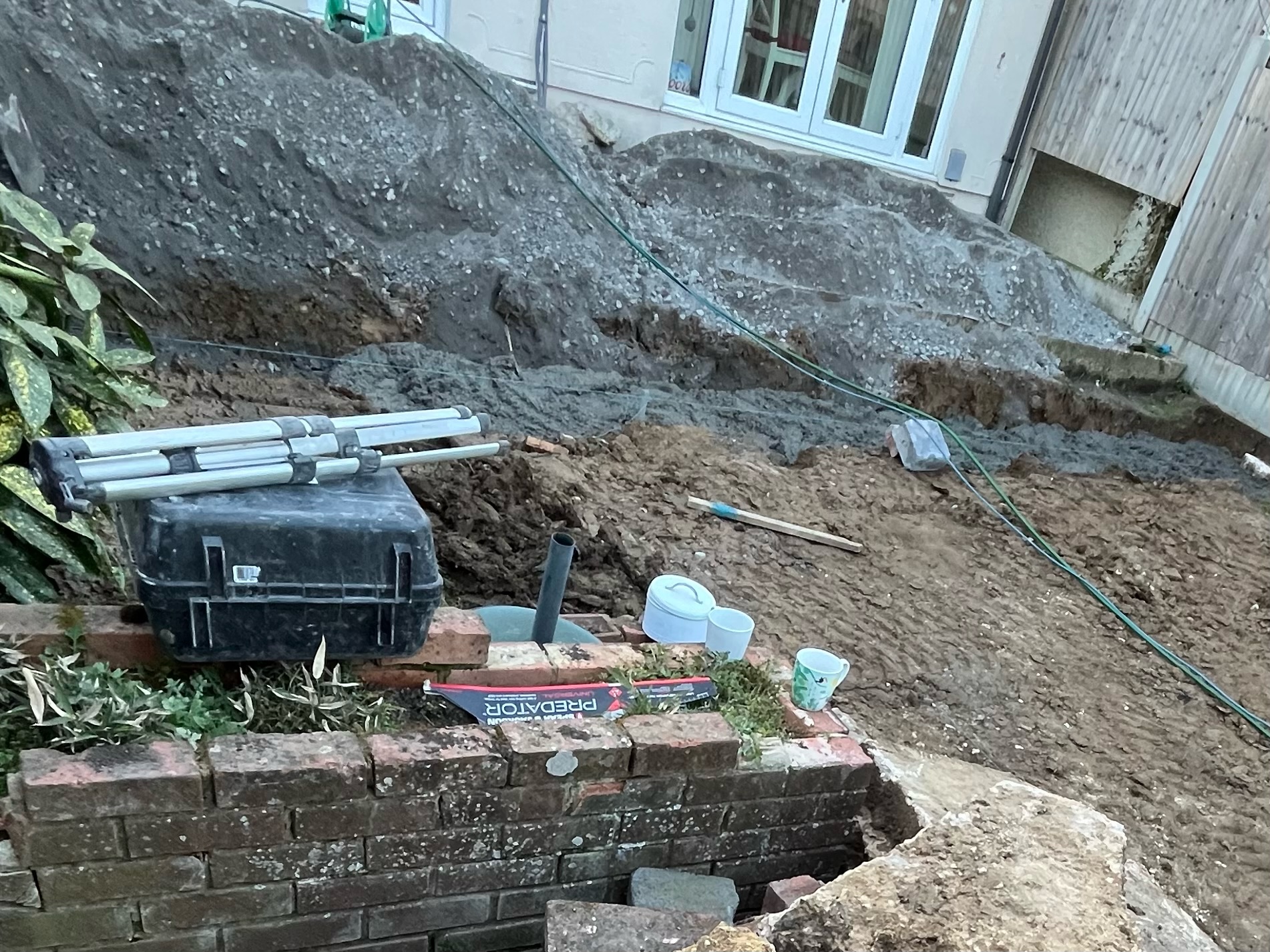 Lava Beige Porcelain Patio with Turf and Play Area before photo 1