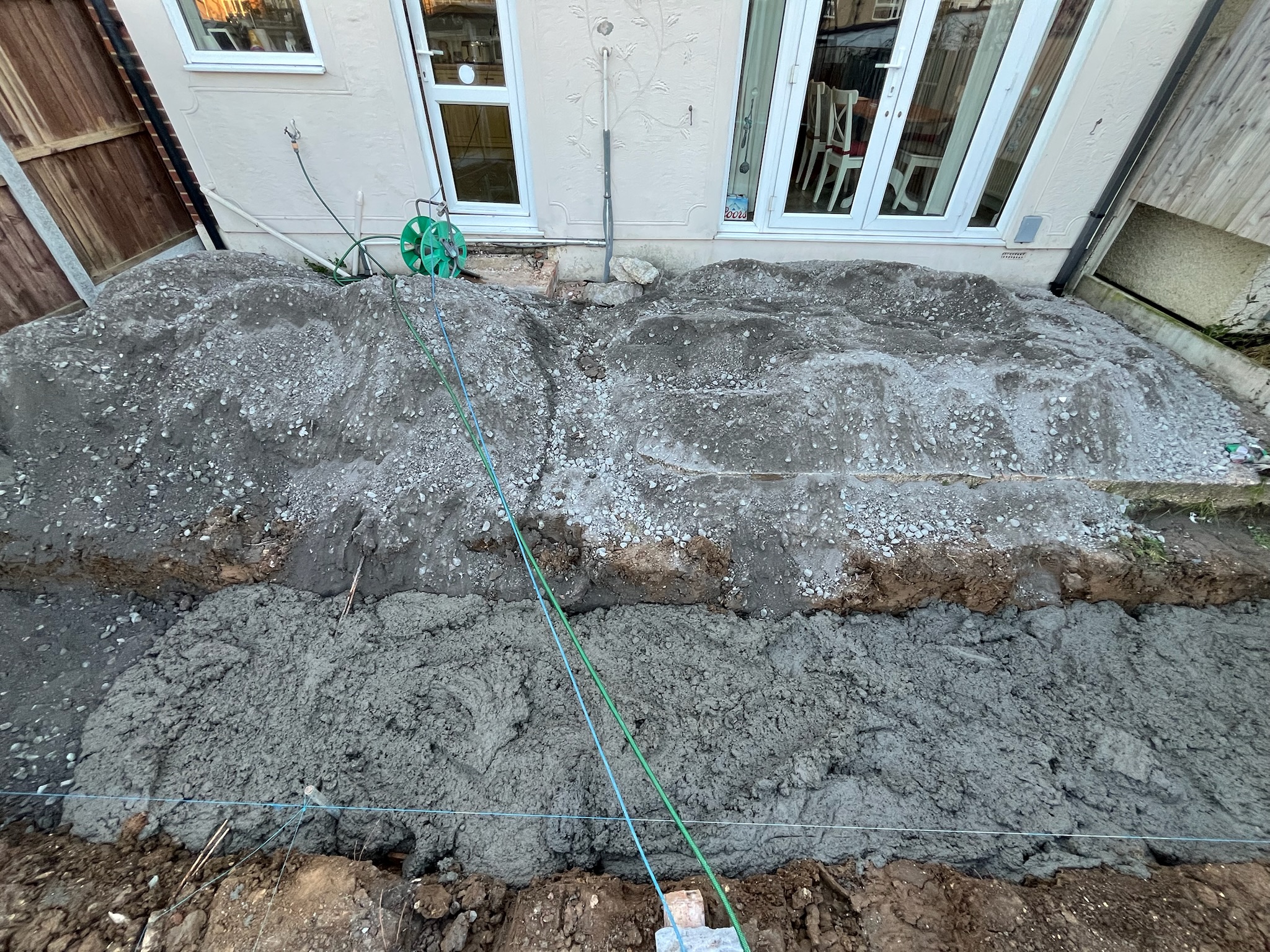 Lava Beige Porcelain Patio with Turf and Play Area before photo 3