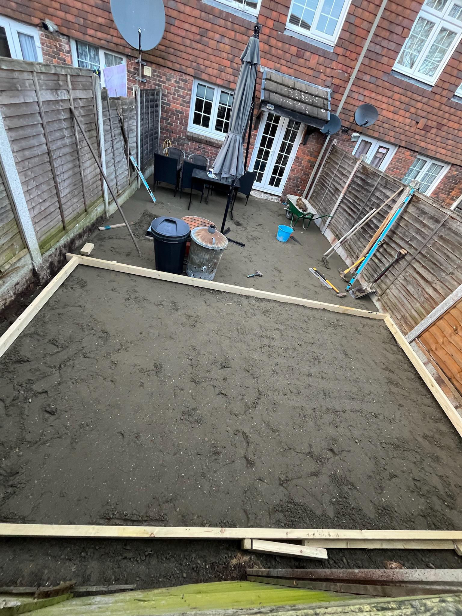 Budget-Friendly Dark Grey Slab Patio finished photo 2