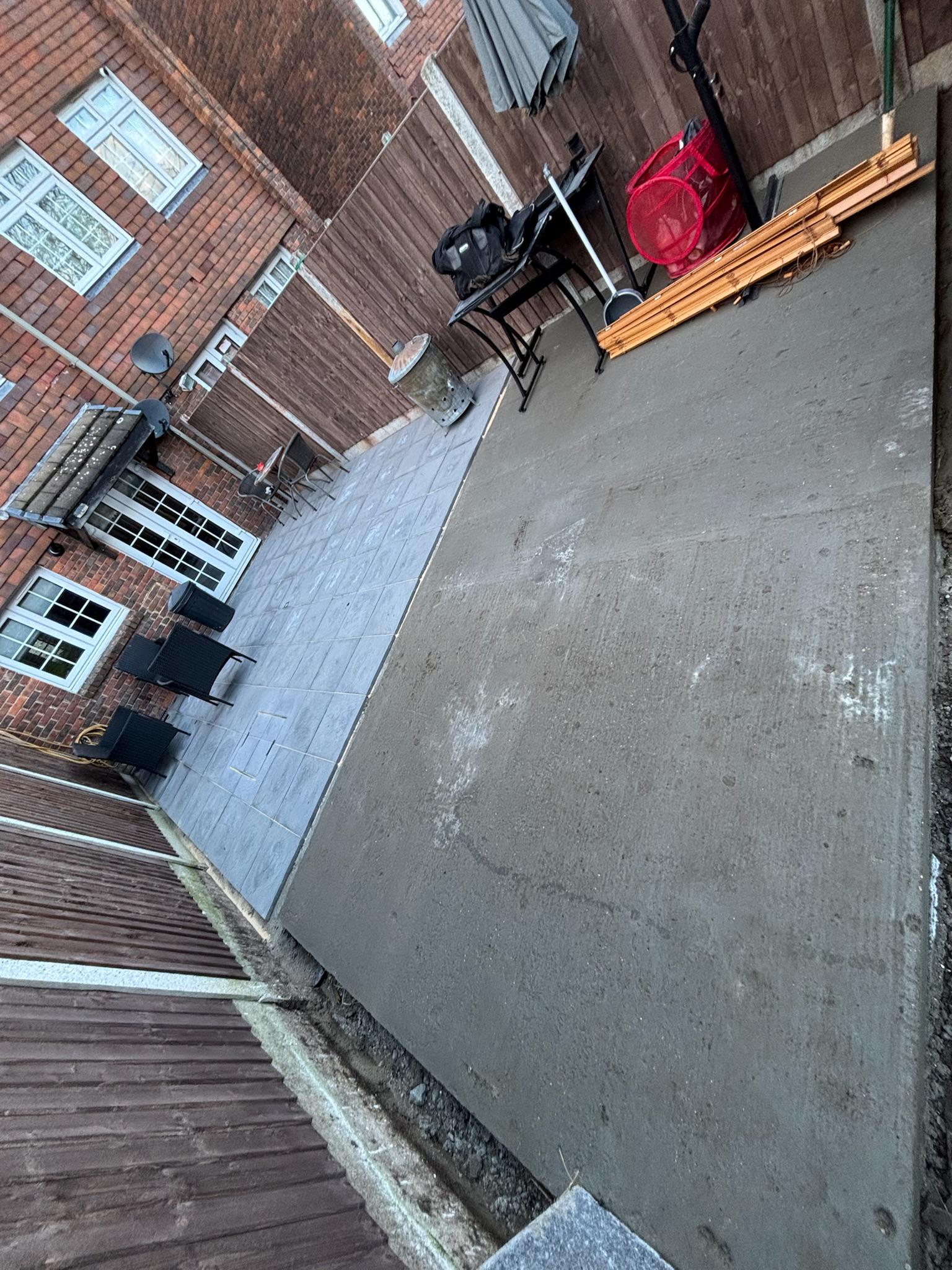 Budget-Friendly Dark Grey Slab Patio finished photo 3
