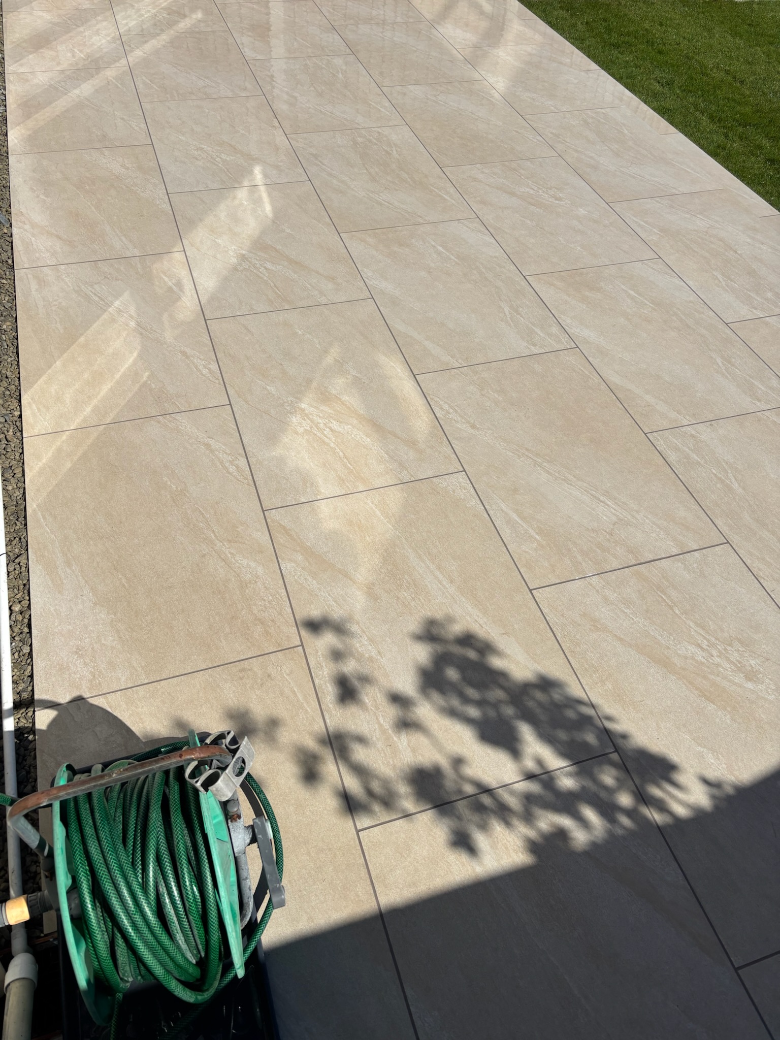 Lava Beige Porcelain Patio with Turf and Play Area finished photo 6