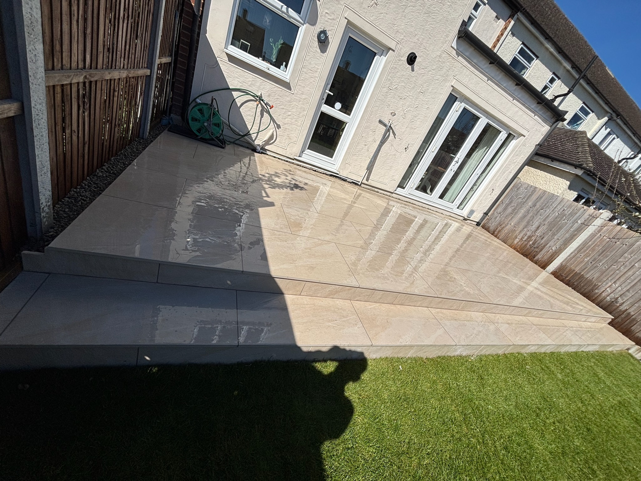 Lava Beige Porcelain Patio with Turf and Play Area finished photo 8